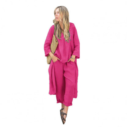 Conjunto de ropa de trabajo: camisa y pantalón holgado de talle alto.