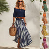 Conjunto de top bajo y falda con abertura para mujer