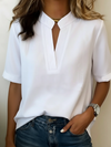 Margarita | Blusa elegante con escote en V y detalles dorados